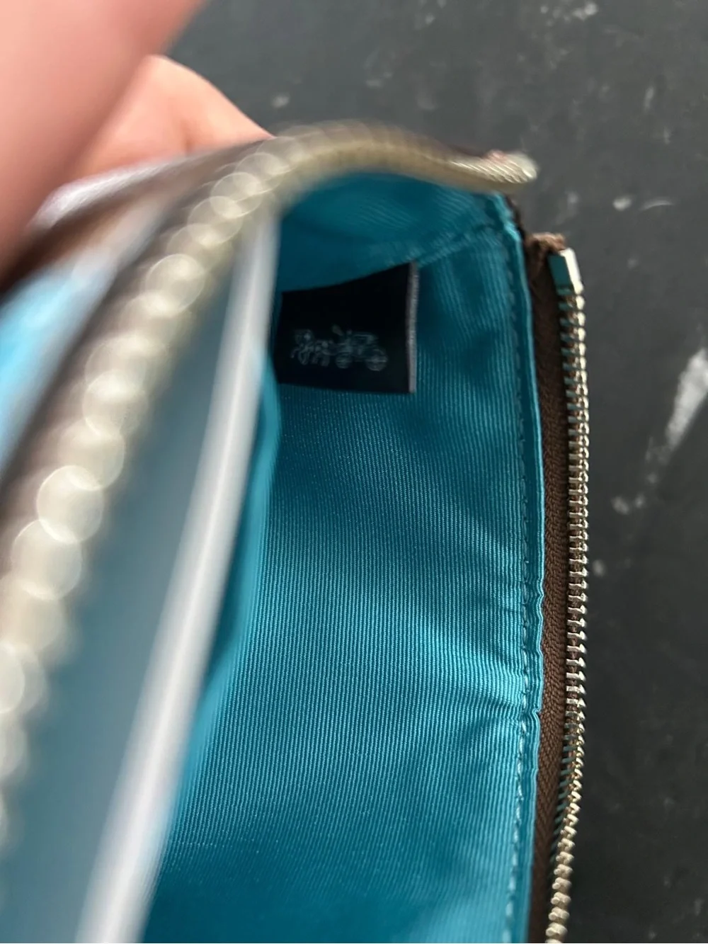 Coach Brown Signature Canvas Wristlet with Turquoise Accent